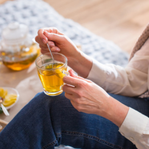 A woman drink a tea